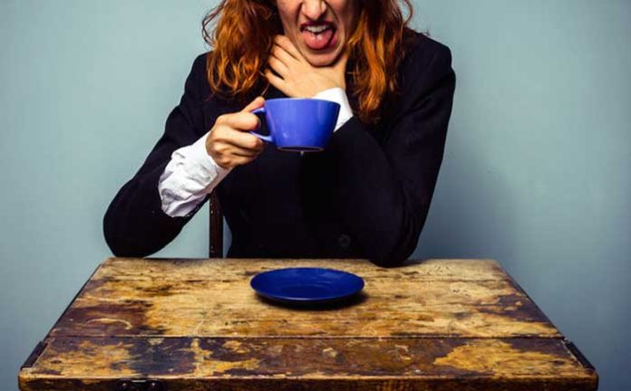 woman drinking bad coffee