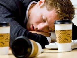 Man sleeping after three cups of coffee