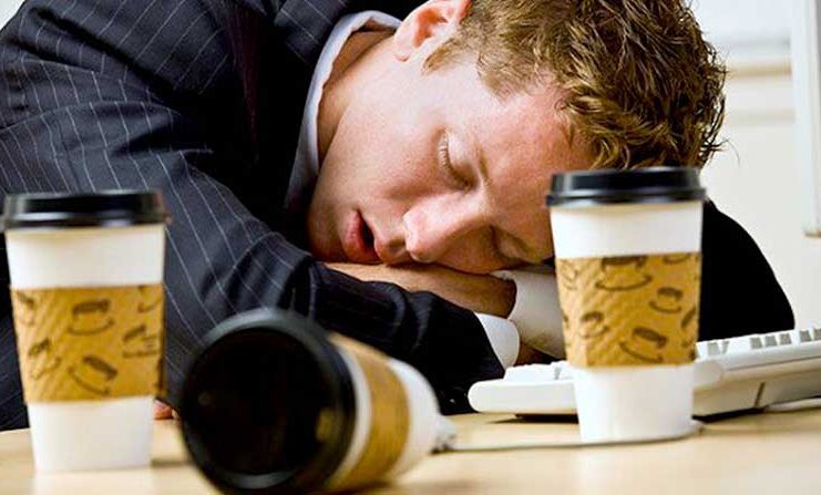Man sleeping after three cups of coffee