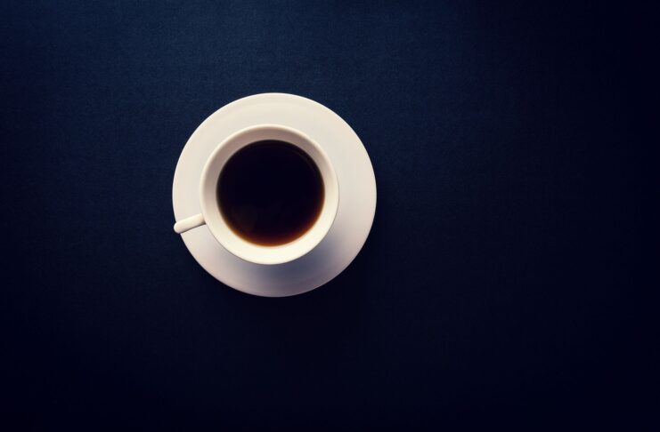 Black coffee with black background
