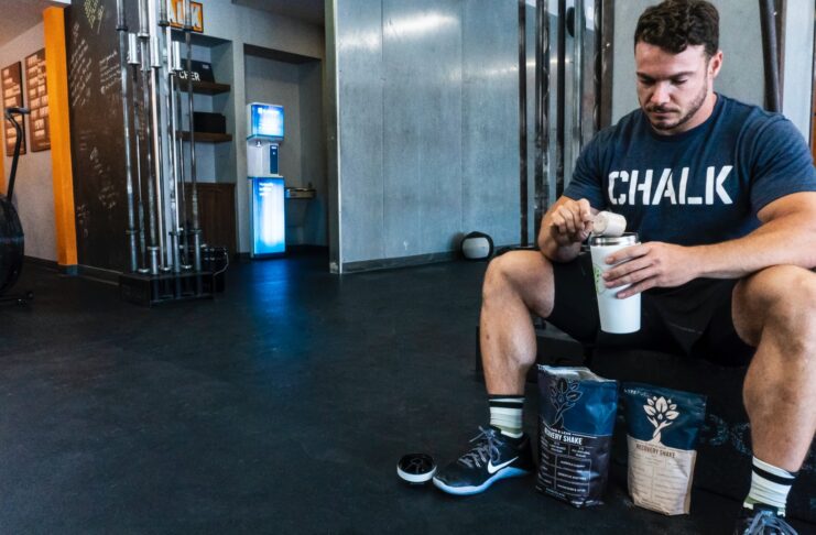 a person making protein shake