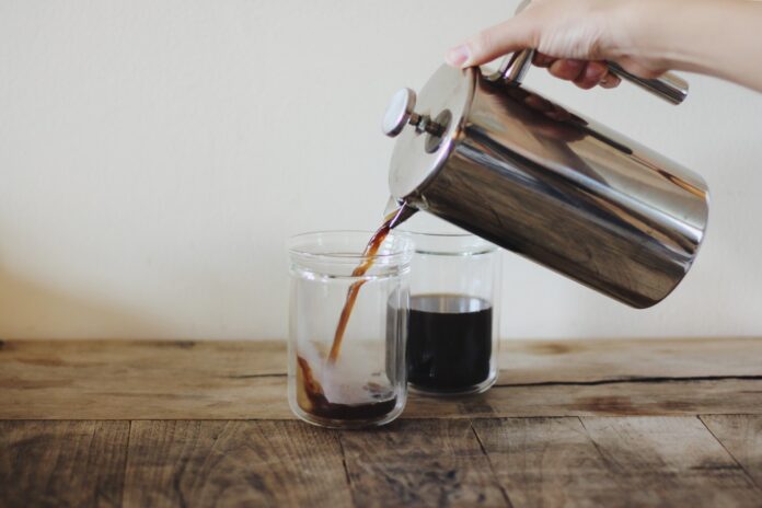 pouring coffee in a cup