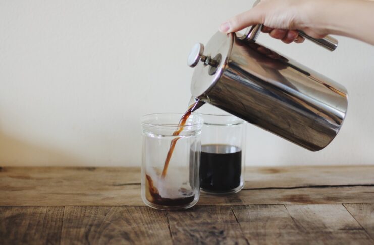 pouring coffee in a cup