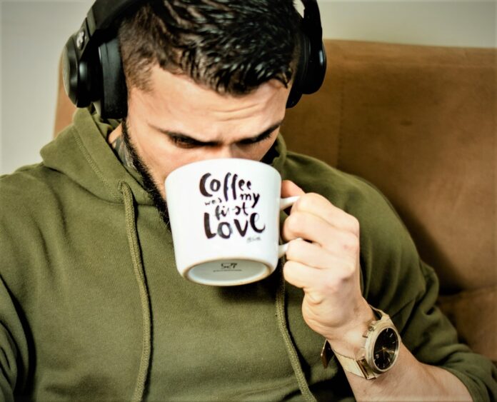 A person drinking coffee
