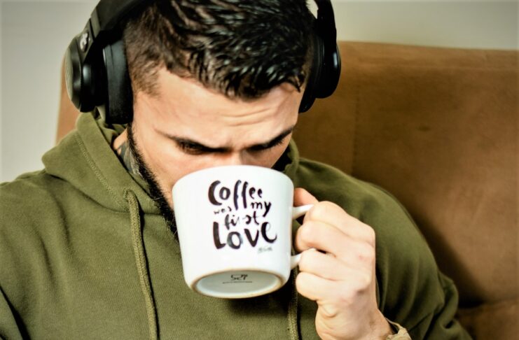 A person drinking coffee