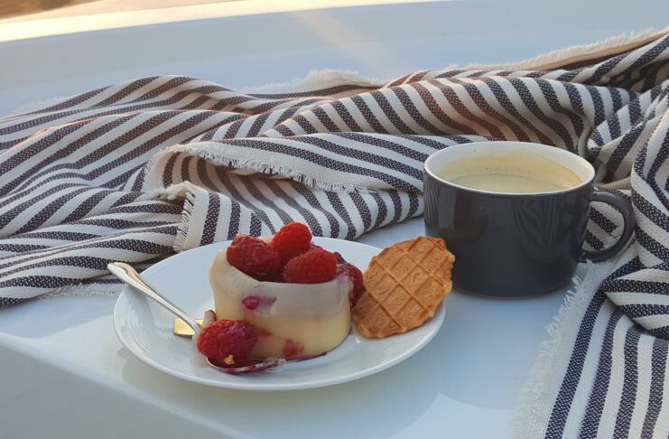 a cup of coffee with sweets