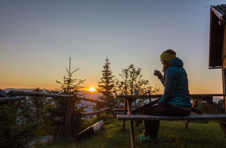 a person drinking coffee in the morning
